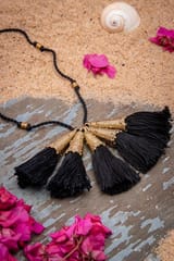 Miharu Crafts-Black Gold Tone Bell Necklace with Tassels