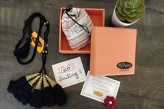 Miharu Crafts-Black Gold Tone Bell Necklace with Tassels