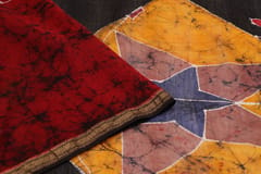 Anoothi-A Handpainted Batik Maheshwari Silk Cotton Saree in Red and Black
