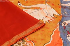 Anoothi-A Handpainted Batik Maheshwari Silk Cotton Saree in Orange