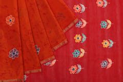 Anoothi-A Handpainted Batik Maheshwari Silk Cotton Saree in Orange and Red