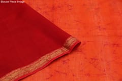 Anoothi-A Handpainted Batik Maheshwari Silk Cotton Saree in Orange and Red