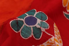 Anoothi-A Handpainted Batik Maheshwari Silk Cotton Saree in Orange and Red