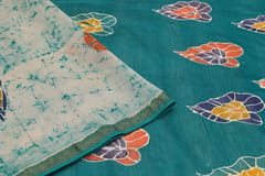 Anoothi-A Handpainted Batik Maheshwari Silk Cotton Saree in Turquoise and White