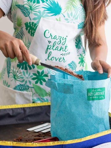 https://cdn.shopify.com/s/files/1/0089/7672/8119/products/gardening-apron-lazygardener-944048.jpg?v=1682274530