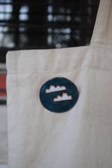 Ekibeki-Baadal Lapel Pin
