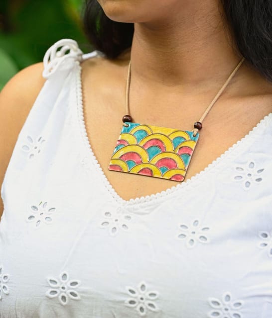 https://cdn.shopify.com/s/files/1/0649/5358/1790/products/Retro-Prismatic-Rectangle-Ekibeki-Copper-Enamel-Pendant-1.jpg?v=1659334135