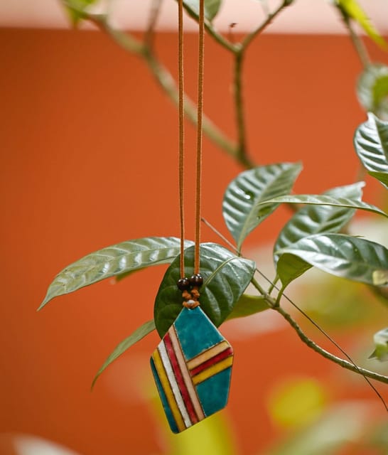 https://cdn.shopify.com/s/files/1/0649/5358/1790/products/Retro-Lines-Ekibeki-Copper-Enamel-Pendant-2.jpg?v=1659333982
