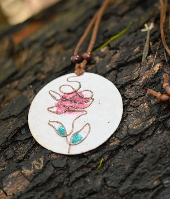 https://cdn.shopify.com/s/files/1/0649/5358/1790/products/Ekibeki-White-Rose-copper-enamel-Pendant-1.jpg?v=1659296056