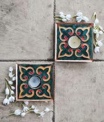https://cdn.shopify.com/s/files/1/0649/5358/1790/products/Ekibeki-green-Rangoli-copper-enameled-handmade-square-Tealight-Holder-Set-of-2_2.jpg?v=1665917932