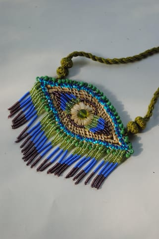 https://cdn.shopify.com/s/files/1/0649/5358/1790/products/nazar-pendant-peacock-2.jpg?v=1677477943