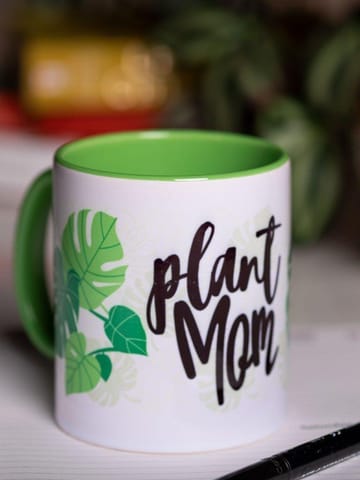 https://cdn.shopify.com/s/files/1/0089/7672/8119/products/plant-mom-mug-coffee-mug-lazygardener-342636.jpg?v=1689792056