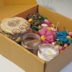 UMW - Eco Diwali Gift Box 1 | Upcycled Flower Toran | Soy Candle Jar | Dates Jar with Filling | Coffee & Orange Body Scrub