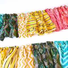 UMW - Upcycled Rainbow Fringe Streamer Garland