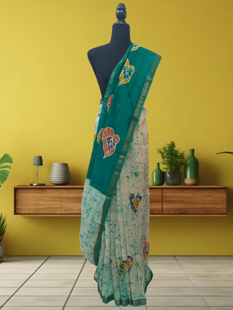 Anoothi-A Handpainted Batik Maheshwari Silk Cotton Saree in Turquoise and White
