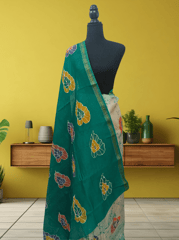 Anoothi-A Handpainted Batik Maheshwari Silk Cotton Saree in Turquoise and White