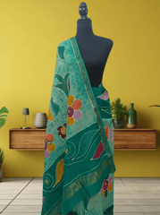 Anoothi-A Handpainted Batik Maheshwari Silk Cotton Saree in Light Green and Dark Green