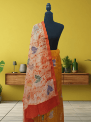 Anoothi-A Handpainted Batik Maheshwari Silk Cotton Saree in Orange and Cream