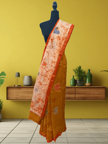 Anoothi-A Handpainted Batik Maheshwari Silk Cotton Saree in Orange and Cream