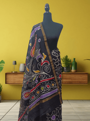 Anoothi-A Handpainted Batik Maheshwari Silk Cotton Saree in Turquoise and White