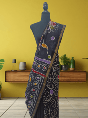Anoothi-A Handpainted Batik Maheshwari Silk Cotton Saree in Turquoise and White