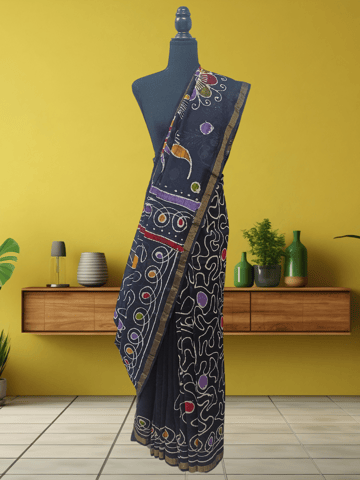 Anoothi-A Handpainted Batik Maheshwari Silk Cotton Saree in Turquoise and White